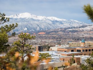 UCCS Campus covered in snow with Pikes Peak in the background